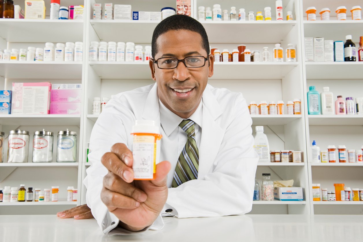 Male pharmactist working in pharmacy